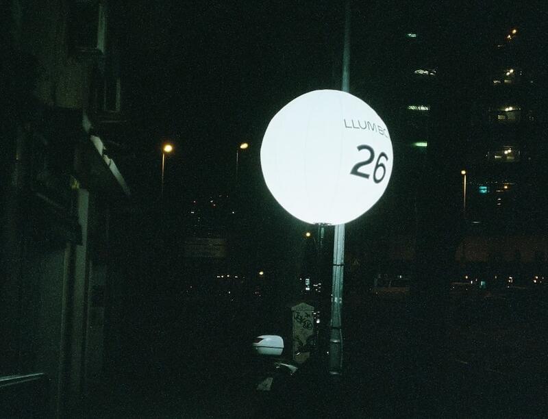 A person sitting at a desk in front of a computer